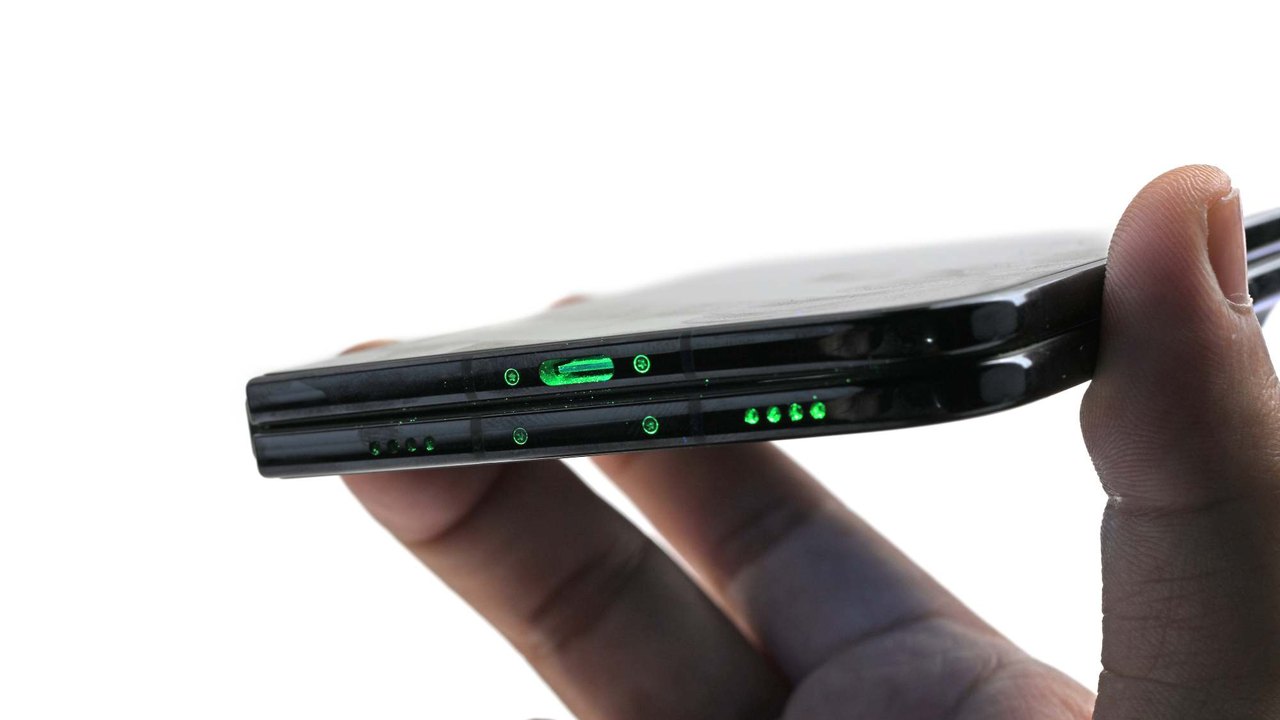 Dust glowing in the iPhone Duo USB port and speakers